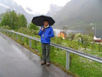 Francisco poses with Mountain and Glacier behind him