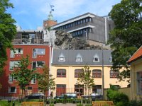 house built on (or in front of) a rock